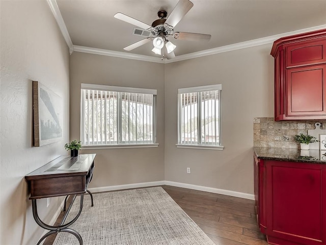 2105 SE 3rd St, Moore, OK 73160 - interior space with wood finished floors, visible vents, a ceiling fan, ornamental molding, and baseboards