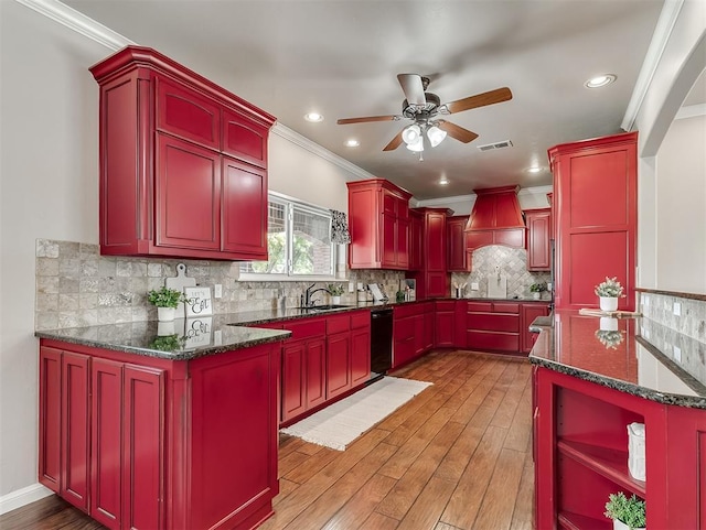 2105 SE 3rd St, Moore, OK 73160 - kitchen featuring dark brown cabinets, visible vents, a ceiling fan, and ornamental molding