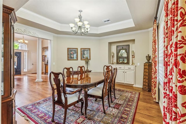 4608 Greystone Ct, Norman, OK 73072 - dining room with light wood-style flooring, visible vents, and a chandelier