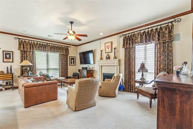 4608 Greystone Ct, Norman, OK 73072 - living room with plenty of natural light, carpet flooring, a ceiling fan, and ornamental molding