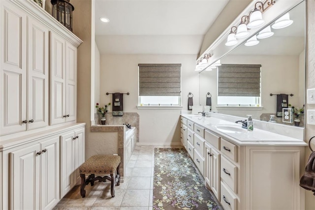 4608 Greystone Ct, Norman, OK 73072 - bathroom featuring a bath, tile patterned floors, a sink, double vanity, and baseboards