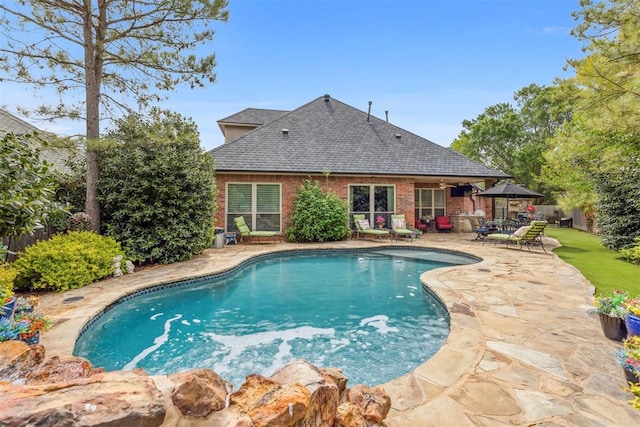 4608 Greystone Ct, Norman, OK 73072 - view of swimming pool with ceiling fan, fence, a patio, and a fenced in pool