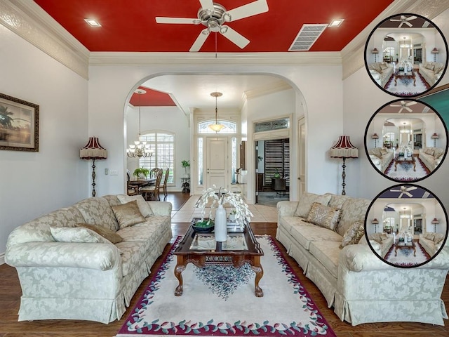 8016 NW 124th St, Oklahoma City, OK 73142 - living area with arched walkways, ornamental molding, ceiling fan, a chandelier, and wood finished floors