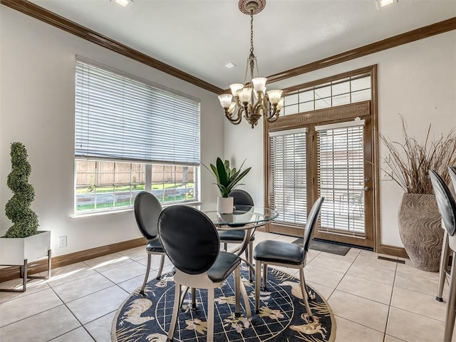 8016 NW 124th St, Oklahoma City, OK 73142 - dining area featuring a chandelier, light tile patterned flooring, ornamental molding, and baseboards