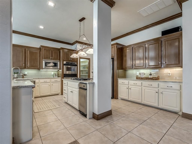 8016 NW 124th St, Oklahoma City, OK 73142 - kitchen featuring ornamental molding, a sink, light tile patterned floors, decorative backsplash, and stainless steel microwave