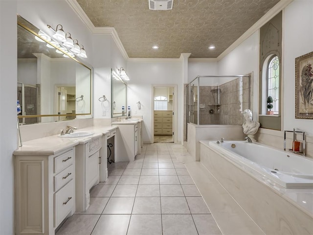 8016 NW 124th St, Oklahoma City, OK 73142 - bathroom featuring a shower stall, a garden tub, crown molding, two vanities, and tile patterned floors