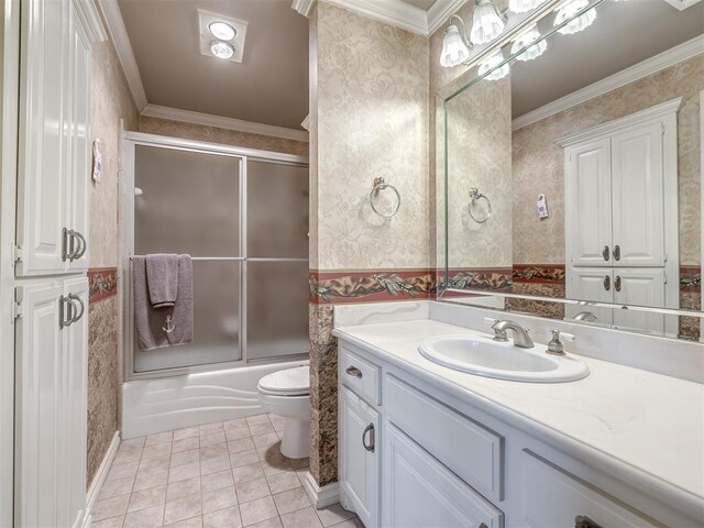 8016 NW 124th St, Oklahoma City, OK 73142 - full bath with toilet, wallpapered walls, ornamental molding, vanity, and combined bath / shower with glass door