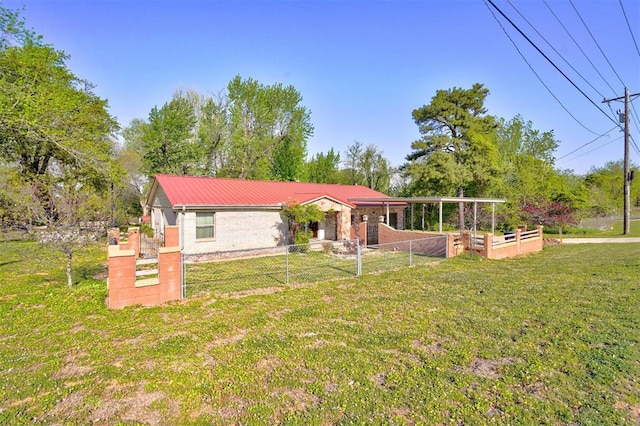 6205 S Choctaw Rd, Choctaw, OK 73020 - view of front of property with a vegetable garden, a front lawn, and fence private yard
