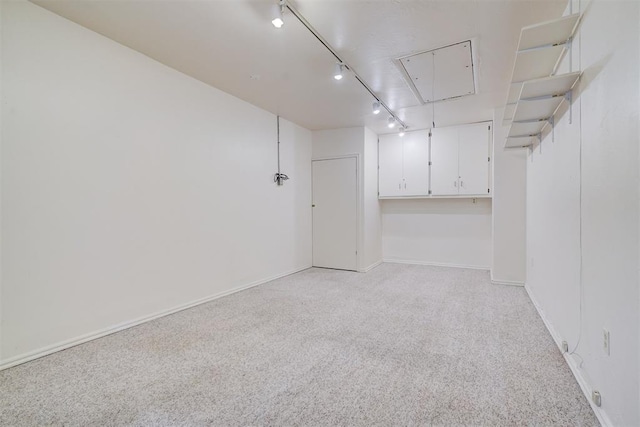 6205 S Choctaw Rd, Choctaw, OK 73020 - below grade area with light colored carpet and baseboards