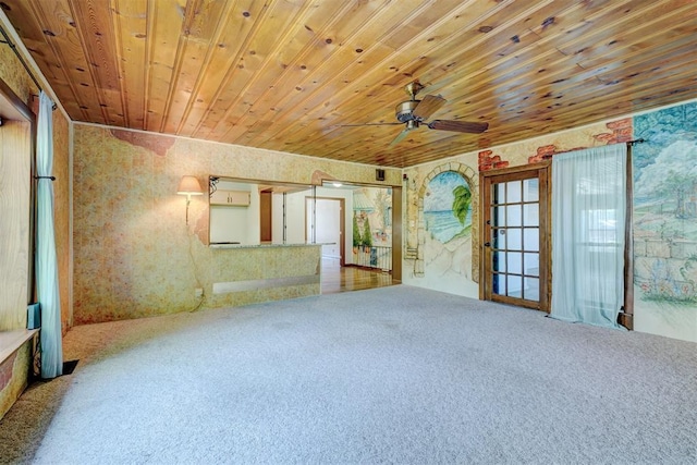 6205 S Choctaw Rd, Choctaw, OK 73020 - unfurnished living room with wood ceiling, ceiling fan, and carpet
