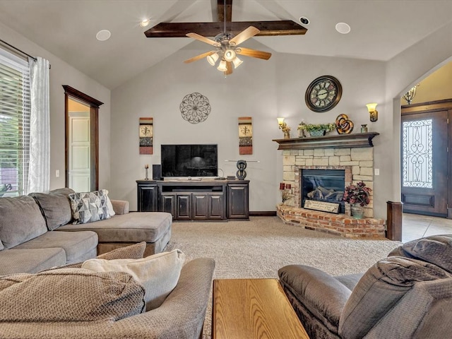13401 Grapevine Trl, Oklahoma City, OK 73170 - living area with a ceiling fan, a stone fireplace, light colored carpet, beamed ceiling, and high vaulted ceiling