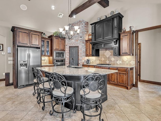 13401 Grapevine Trl, Oklahoma City, OK 73170 - kitchen featuring appliances with stainless steel finishes, a sink, decorative backsplash, a chandelier, and beam ceiling