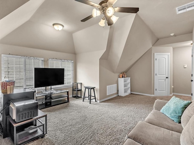 13401 Grapevine Trl, Oklahoma City, OK 73170 - carpeted living area featuring baseboards, ceiling fan, and lofted ceiling