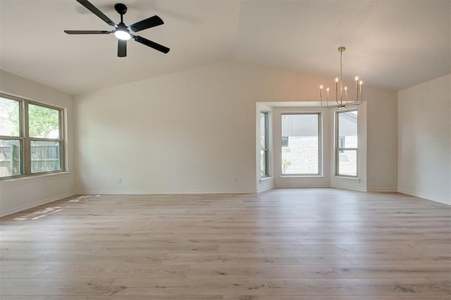 1804 Foxfire Rd, Edmond, OK 73003 - unfurnished room with vaulted ceiling, baseboards, and light wood-type flooring