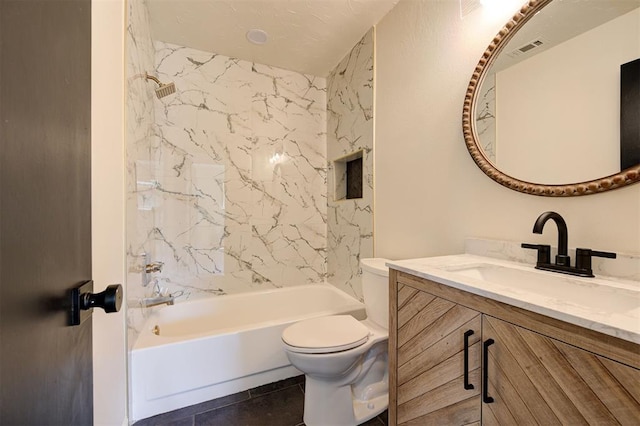 1804 Foxfire Rd, Edmond, OK 73003 - bathroom featuring tile patterned floors, visible vents, toilet, vanity, and shower / tub combination