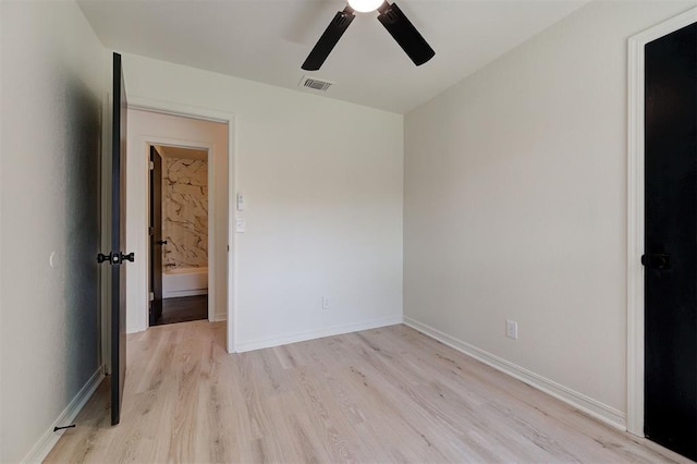 1804 Foxfire Rd, Edmond, OK 73003 - unfurnished bedroom featuring baseboards, light wood-style flooring, visible vents, and ceiling fan