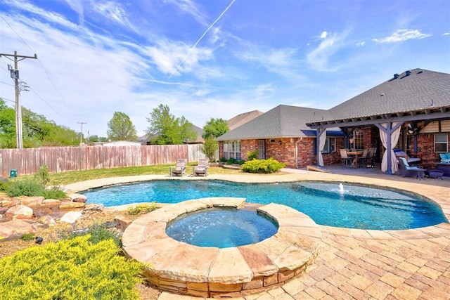 view of swimming pool with a patio, a fenced backyard, an in ground hot tub, and a fenced in pool