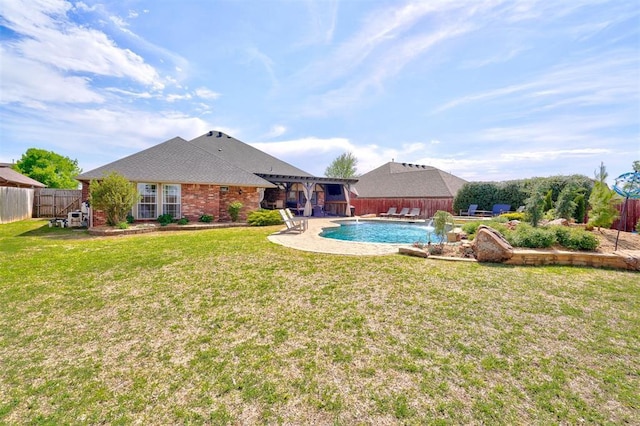 view of pool with a fenced backyard, a yard, a patio, and a fenced in pool