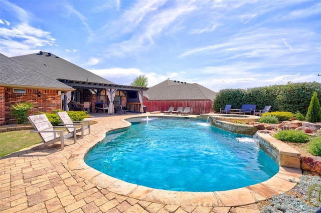view of swimming pool featuring fence, a patio area, an in ground hot tub, and a fenced in pool