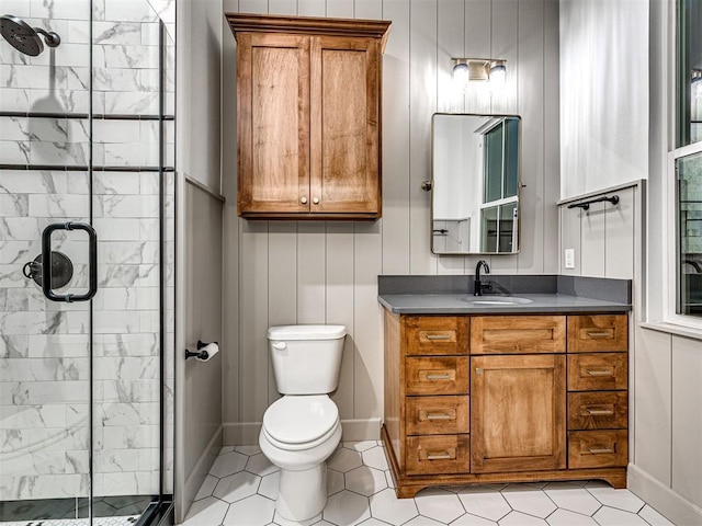 18443 Boardwalk Xing, Norman, OK 73072 - bathroom featuring vanity, toilet, tile patterned flooring, and a shower stall