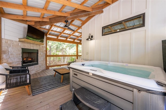 119 Leadwood Trl, Broken Bow, OK 74728 - wooden deck featuring an outdoor stone fireplace and a hot tub