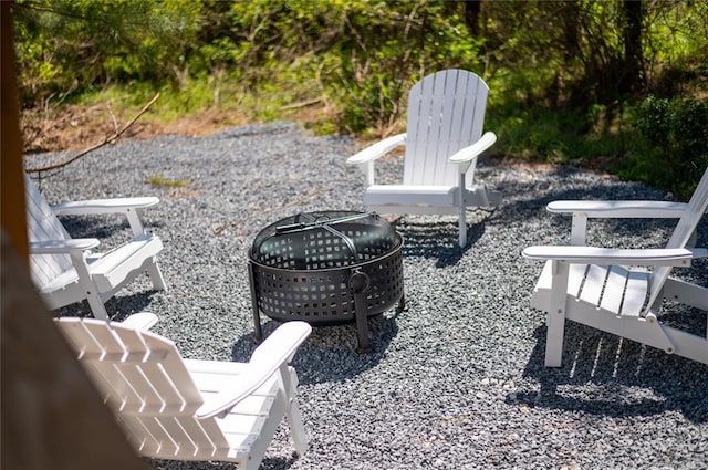 119 Leadwood Trl, Broken Bow, OK 74728 - view of patio / terrace featuring a fire pit