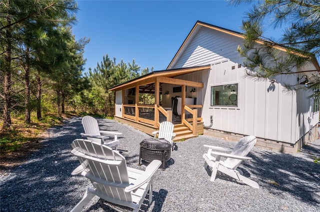 119 Leadwood Trl, Broken Bow, OK 74728 - view of patio / terrace with a wooden deck and an outdoor fire pit
