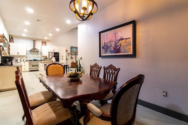 dining space with recessed lighting, a notable chandelier, visible vents, and vaulted ceiling
