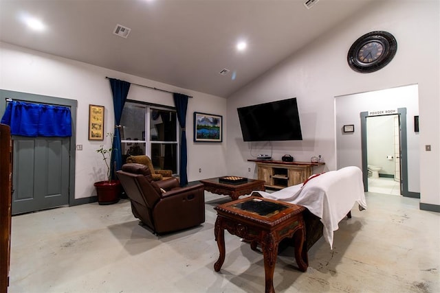 living room featuring baseboards, visible vents, and concrete floors