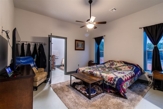bedroom featuring ceiling fan and visible vents