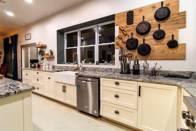 kitchen with light stone countertops, open shelves, dishwasher, a sink, and concrete floors