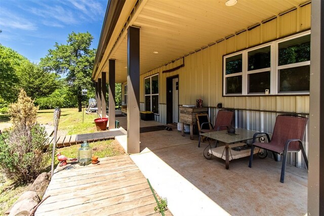 view of patio with a deck