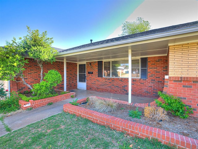 3402 Oakhurst Dr, Oklahoma City, OK 73110 - view of front of house featuring brick siding and a porch