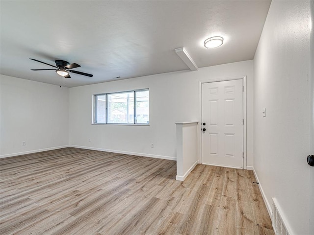3402 Oakhurst Dr, Oklahoma City, OK 73110 - empty room featuring ceiling fan, baseboards, visible vents, and light wood-style flooring