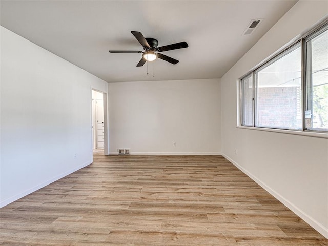 3402 Oakhurst Dr, Oklahoma City, OK 73110 - empty room featuring visible vents, a wealth of natural light, and ceiling fan