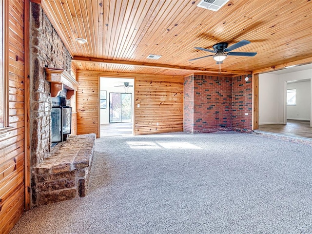 3402 Oakhurst Dr, Oklahoma City, OK 73110 - unfurnished living room featuring wood ceiling, ceiling fan, carpet, and plenty of natural light