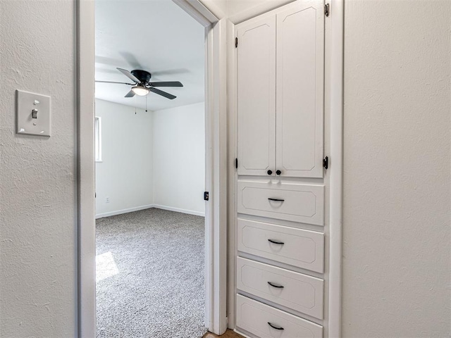 3402 Oakhurst Dr, Oklahoma City, OK 73110 - hall featuring light carpet, baseboards, and a textured wall