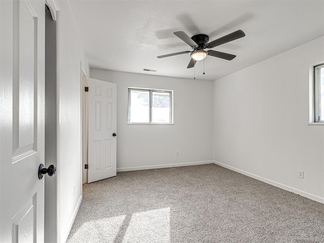 3402 Oakhurst Dr, Oklahoma City, OK 73110 - carpeted spare room featuring ceiling fan, baseboards, and visible vents