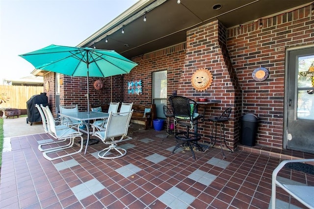 view of patio with fence