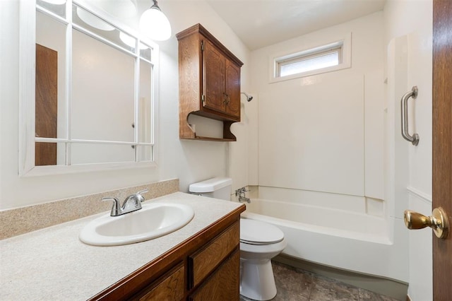 full bathroom with vanity,  shower combination, and toilet