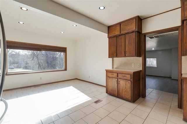 kitchen featuring recessed lighting and light tile patterned floors