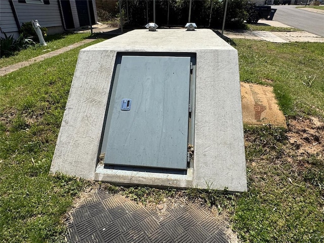 608 Roosevelt St, Seminole, OK 74868 - view of storm shelter featuring a yard