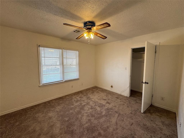 608 Roosevelt St, Seminole, OK 74868 - unfurnished bedroom featuring visible vents, carpet floors, a textured ceiling, and a closet
