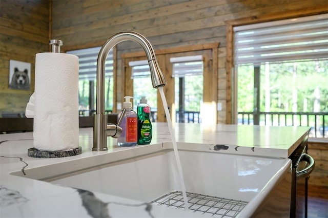 66 Morning Pines Trl, Broken Bow, OK 74728 - interior details featuring wooden walls and a sink