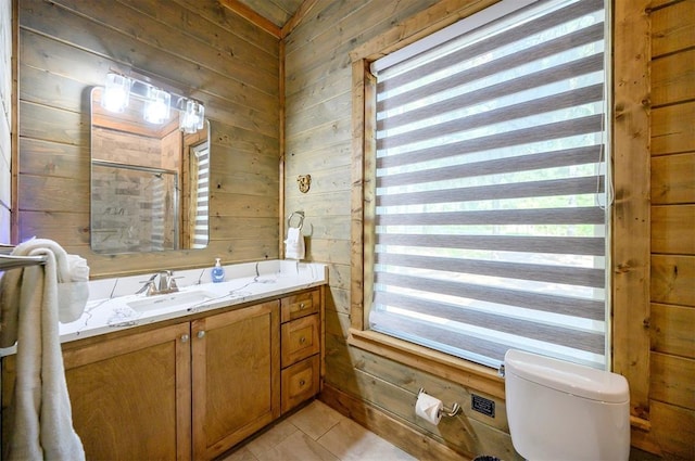 66 Morning Pines Trl, Broken Bow, OK 74728 - full bath featuring wooden walls, tile patterned floors, and toilet