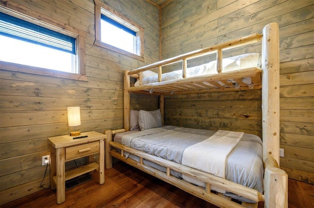 66 Morning Pines Trl, Broken Bow, OK 74728 - bedroom with wooden walls and wood finished floors