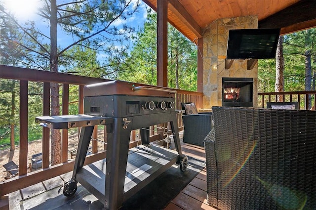 66 Morning Pines Trl, Broken Bow, OK 74728 - wooden deck with an outdoor stone fireplace