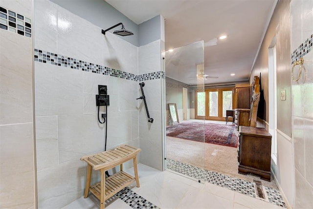 bathroom with recessed lighting, a ceiling fan, and a walk in shower