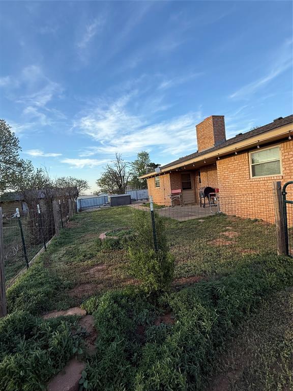 4108 N Broadway Ave, Hinton, OK 73047 - view of yard with a patio and a fenced backyard