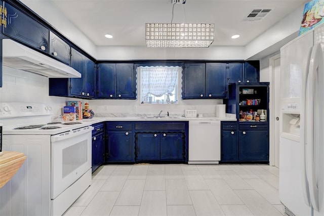 kitchen with under cabinet range hood, light countertops, visible vents, blue cabinets, and white appliances